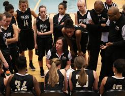 Penn Coach Kristi Ulrich with the Penn Girls Basketball team